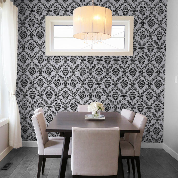 Detailed shot highlighting the intricate black and white floral pattern on Doodad Floral Monochrome Wallpaper.